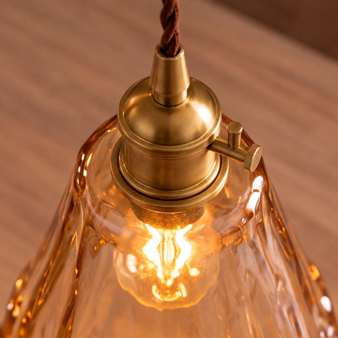 Vintage-Inspired Hanging Pendant Light with Adjustable Brass Mount and Amber Glass Shade