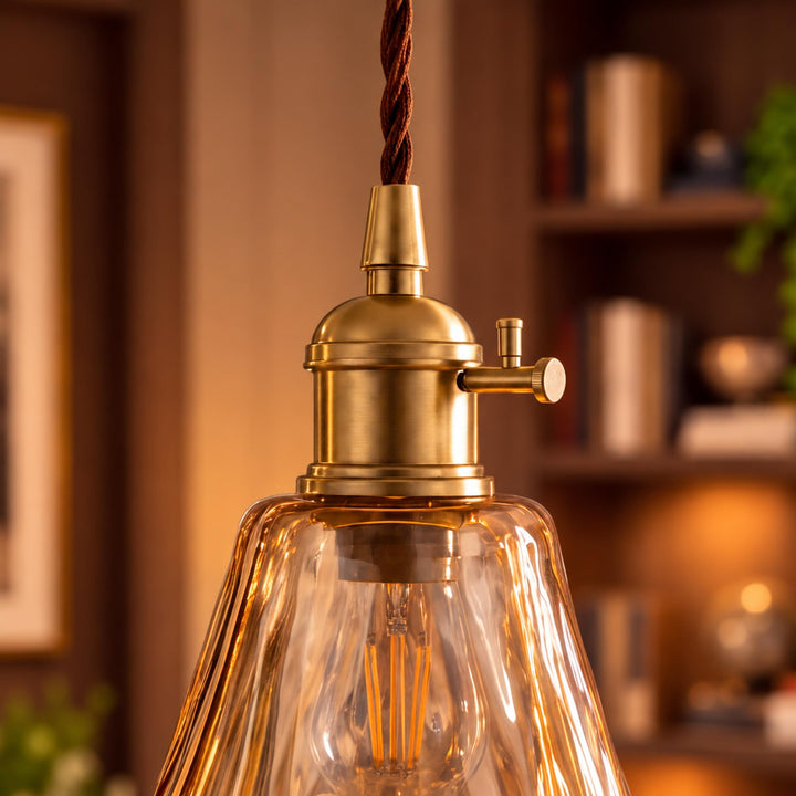 Vintage-Inspired Hanging Pendant Light with Adjustable Brass Mount and Amber Glass Shade