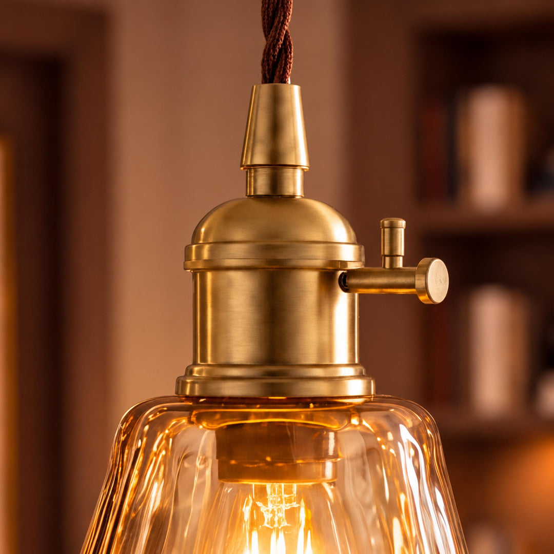 Vintage-Inspired Hanging Pendant Light with Adjustable Brass Mount and Amber Glass Shade