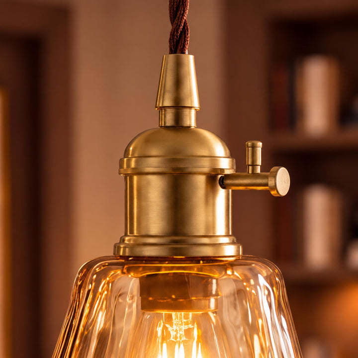 Vintage-Inspired Hanging Pendant Light with Adjustable Brass Mount and Amber Glass Shade