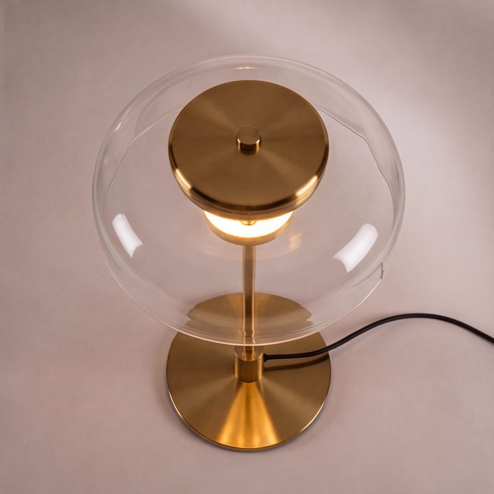 Modern Table Lamp with Adjustable Brass Body and Clear Glass Shade for Warm LED Lighting